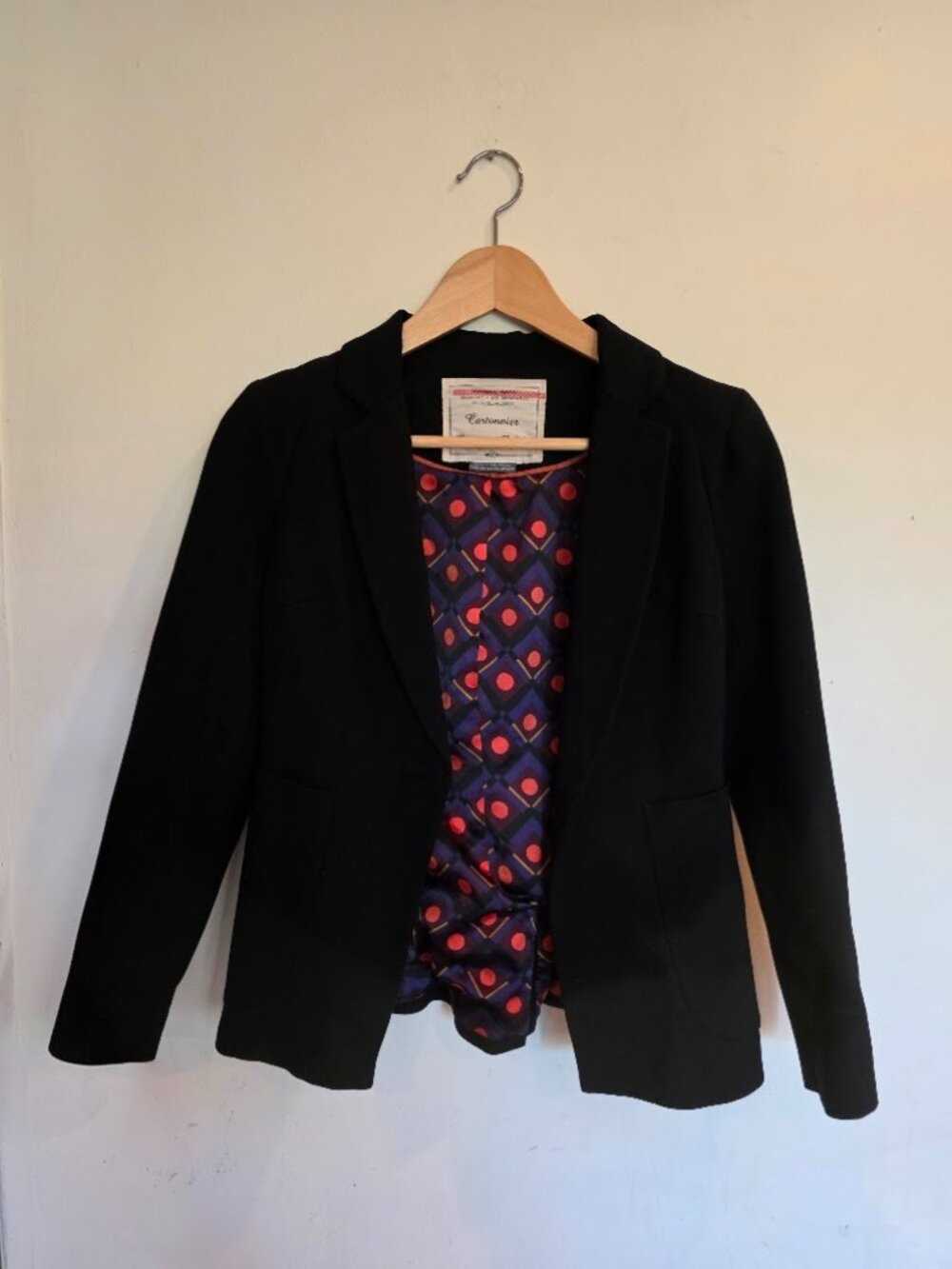 Cantonnier black blazer with abstract purple/orange lining. Size 0P.